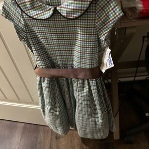 Acorn Plaid Empire Dress with Brown Accent.  It is a boutique dress Bailey boys